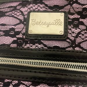 Betseyville bag. pink bag with black